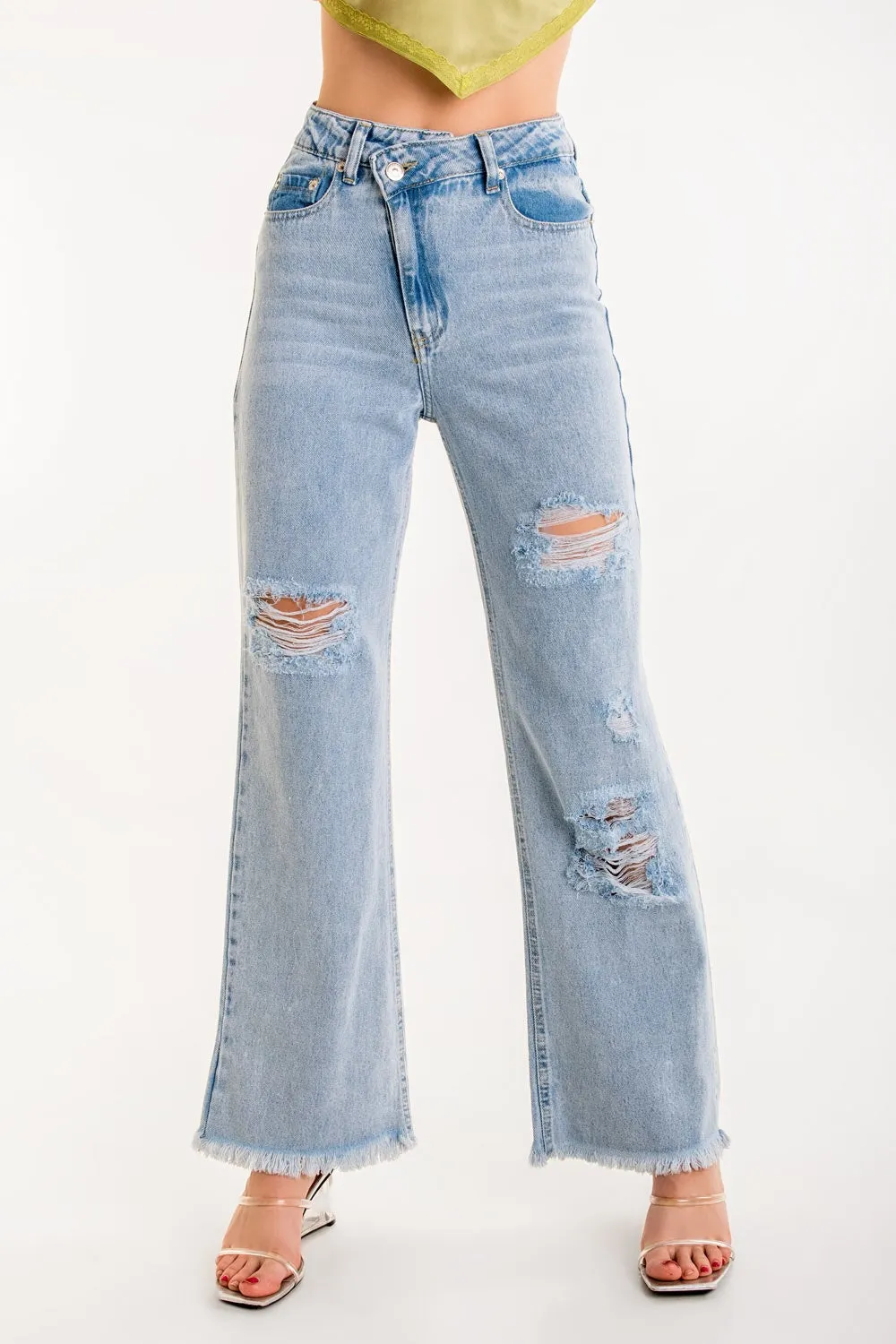 Pantalón pretina criss cross con rotos acid denim